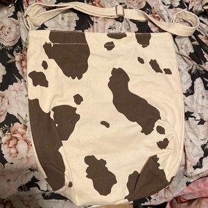 Urban outfitters cow print tote bag with strap